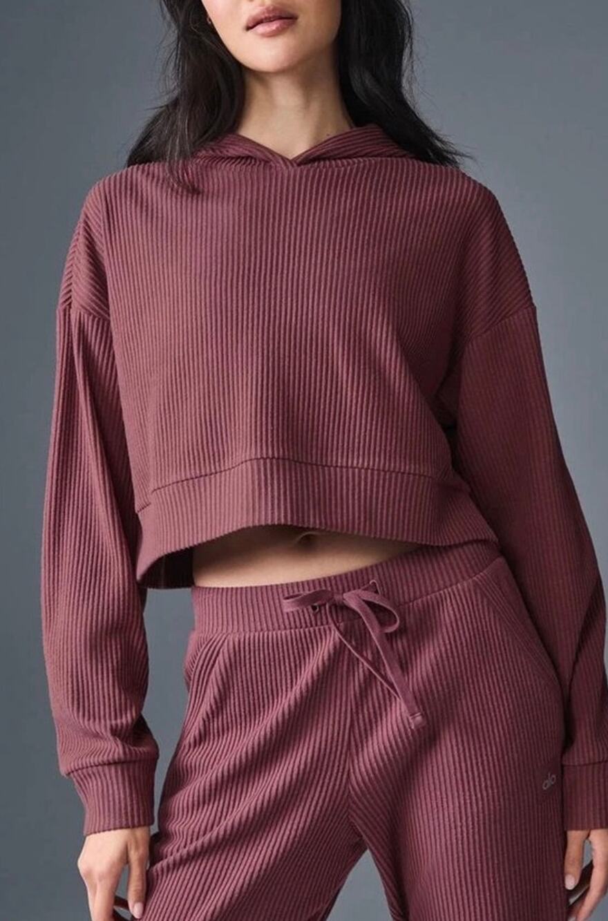 Alo Yoga Muse Hoodie in a mauve or dusty rose color